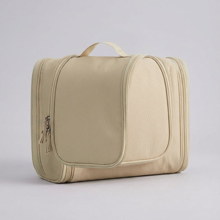 Graue, faltbare Kulturtasche als Reiseorganizer, hält Ihre Hygieneartikel ordentlich und griffbereit.