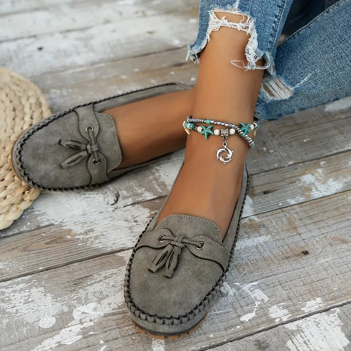 Bequeme Damen Loafer in klassischem Design mit dekorativer Schleife, ideal für Büro & Freizeit.