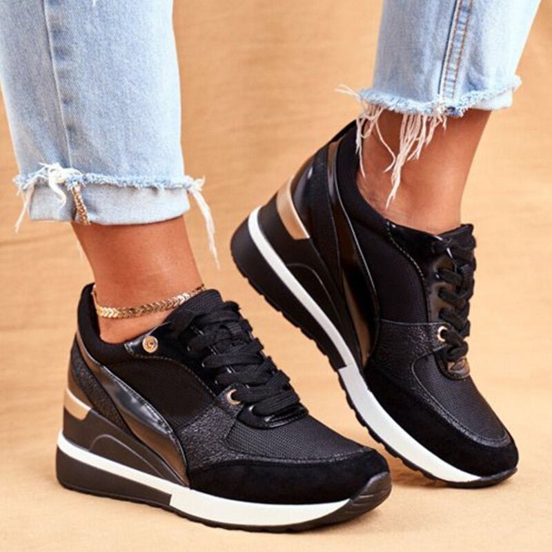 Orthopädische schwarze Schnürschuhe für Damen, die optimale Fußgewölbestütze und Komfort bieten.