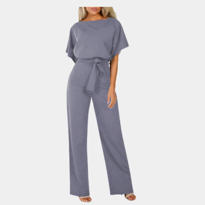 Eleganter Damen Jumpsuit mit weitem Bein und Taillengürtel, perfekt für stilvolle Auftritte bei Party & Abendmode.