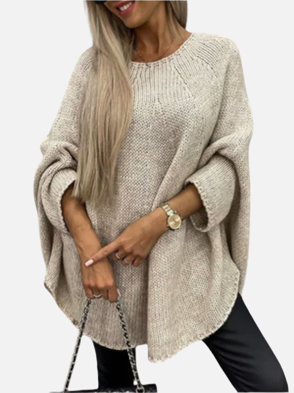 Eleganter Damen Oversize Strickponcho für stilvolle Wintertage. Bequemer femininer Pullover im Lagenlook für Freizeit & Alltag.