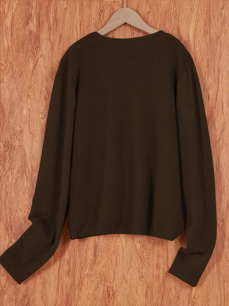 Basic Damen Strickjacke in neutralem Farbton, locker geschnitten für Komfort im Alltag.