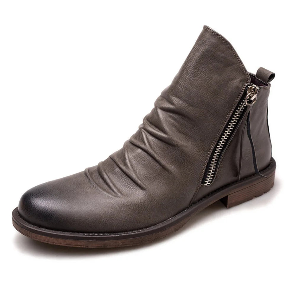 Lässige Herren Chelsea Boots zum Jeans-Outfit; modische Schlupfstiefel für den entspannten Alltag.