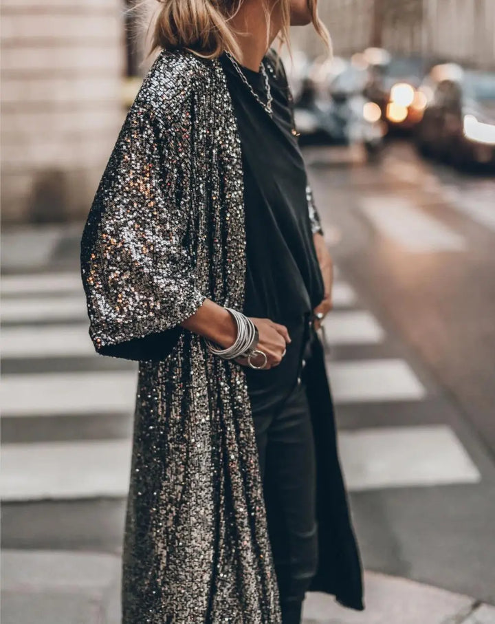 Eleganter Damen-Abendmantel für den Herbst mit Gürtel, Reverskragen und praktischen Taschen. Stilvoll.