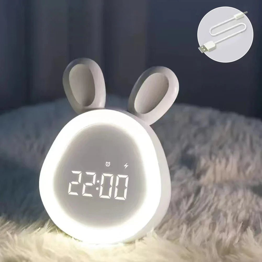 Sanftes LED Nachtlicht und Wecker in Kaninchenform. Dimmbar, fördert Schlaf und angenehme Morgenroutine im Kinderzimmer.