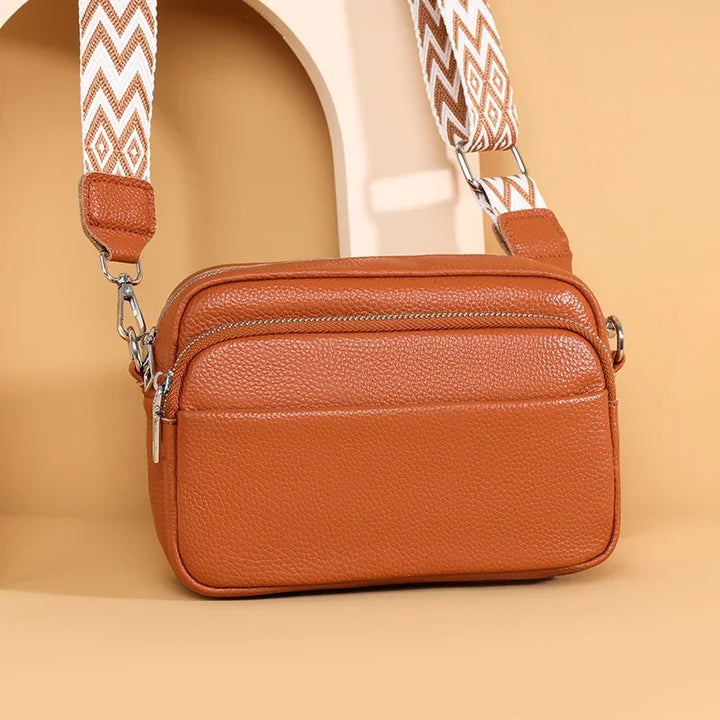 Hellbraune elegante Damen-Handtasche aus echtem Premium-Leder, zeitloses Design.