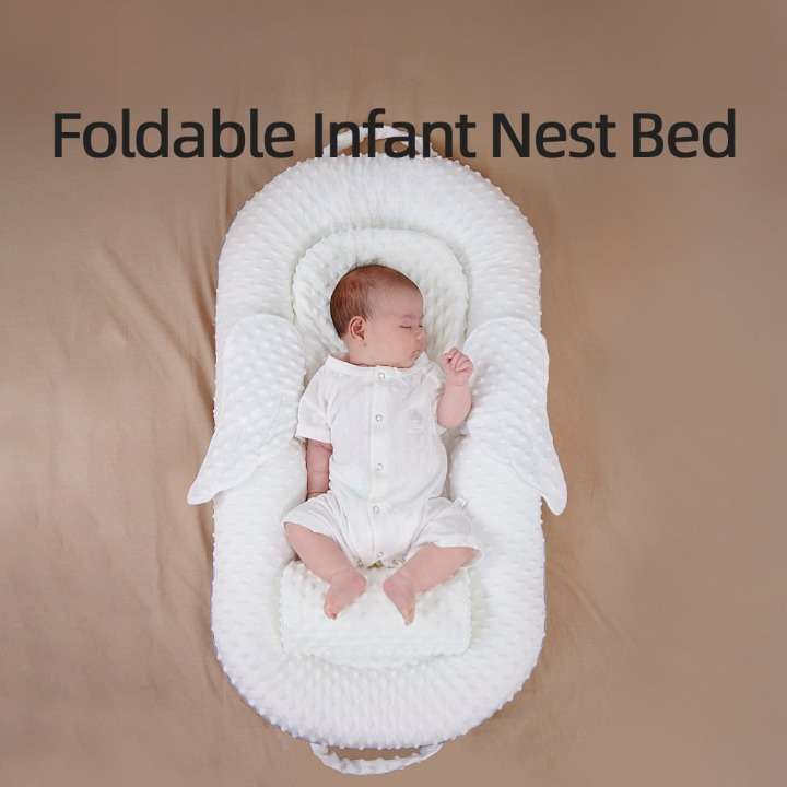 Kompaktes, faltbares Babynest, ideal für Reisen. Bietet Neugeborenen Komfort und Sicherheit unterwegs.
