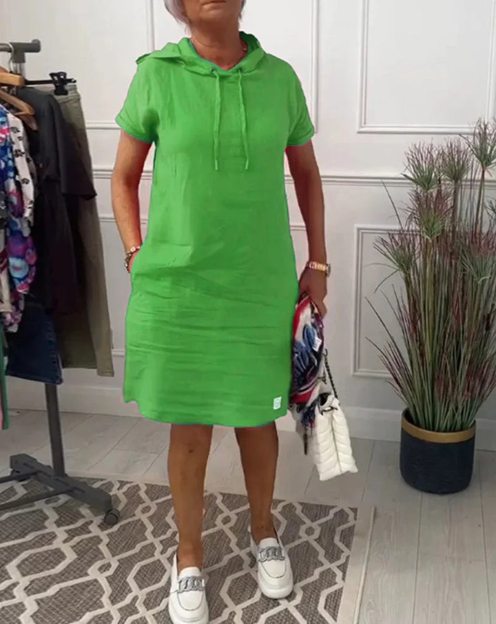 Grünes Damen Kapuzen-Shirtkleid im Oversize-Stil, ein bequemes Freizeitkleid für entspannte Tage.