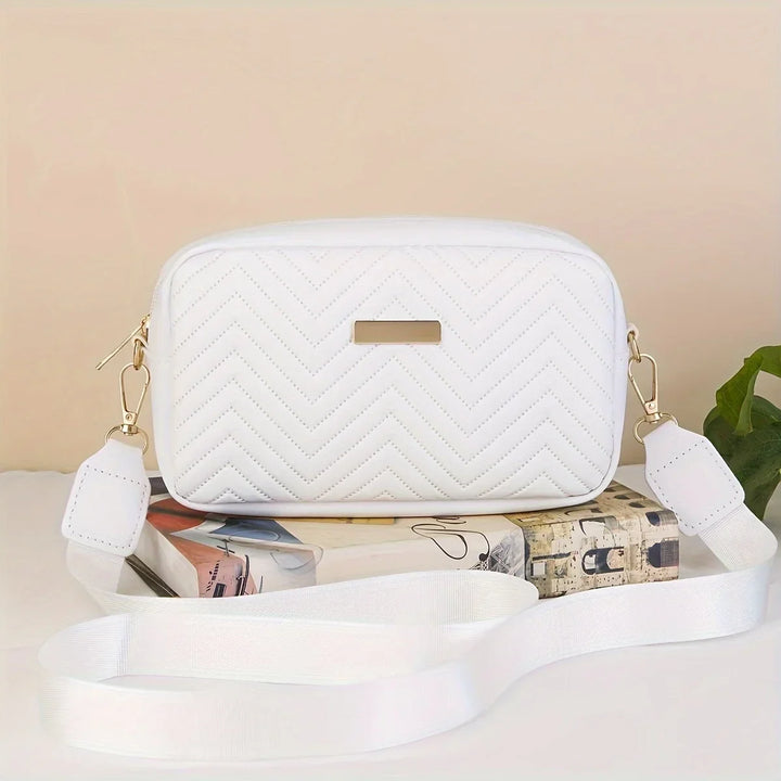 Trendige Damen Kunstleder Schultertasche, mit verstellbarem Gurt und kompaktem Design.