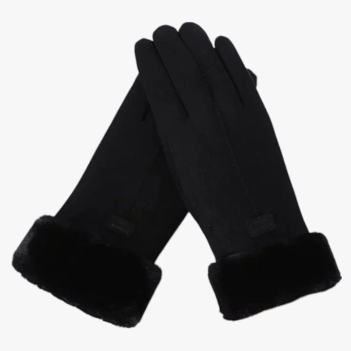 Nahaufnahme eleganter Winterhandschuhe für Damen. Das weiche Material hält warm und ist touchscreen-kompatibel.