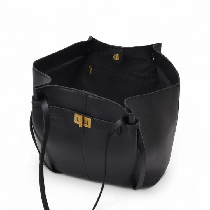 Große Damen Handtasche aus veganem PU-Leder in Schwarz, ideal als Alltagstasche oder Bürotasche.