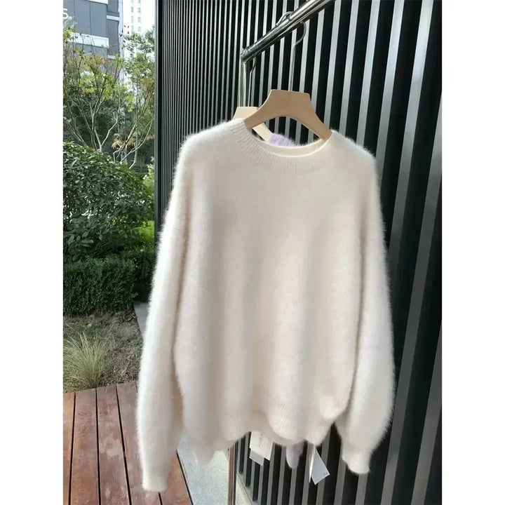 Damen Oversize Pullover in warmem Flausch-Material, modisch & lässig.
