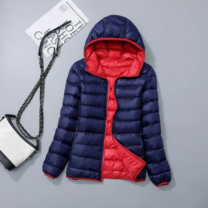 Damen leichte Windjacke mit Kapuze, wendbar, figurschmeichelnd, ideal für Frühling/Herbst.