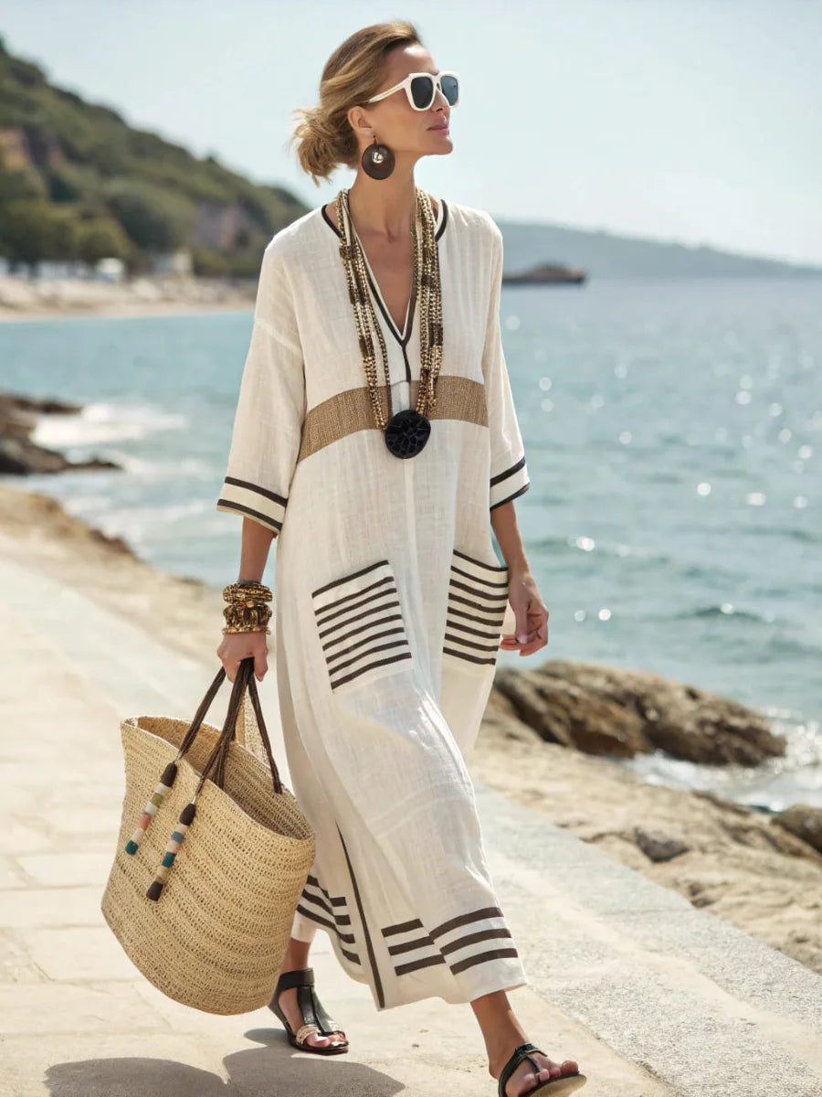 Lässiges Damen Maxikleid mit Streifen, V-Ausschnitt & praktischen Taschen. Ideal als Strandkleid.