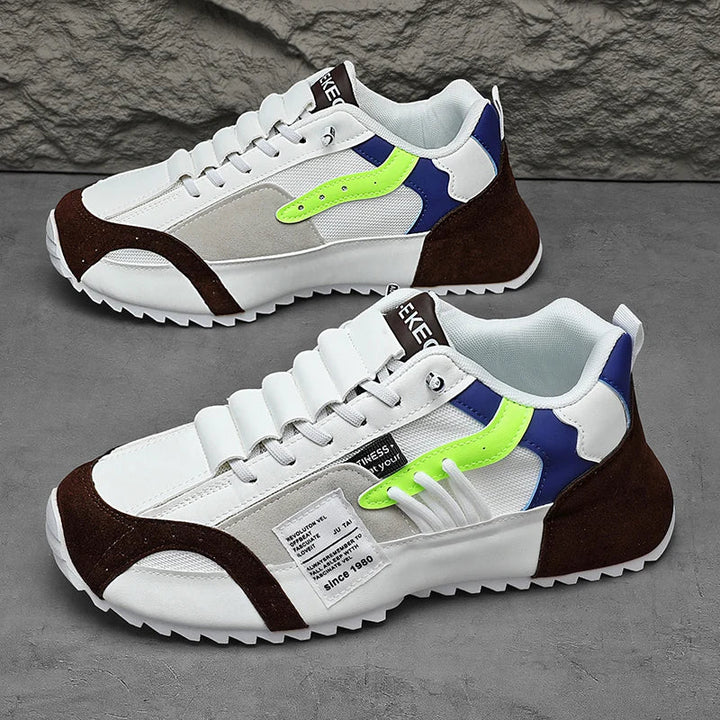 Griffige Spritzgusssohle der dunkelgrauen Herren Knöchelstiefel. Robuste Männerschuhe, ideal für Alltag & Freizeit.