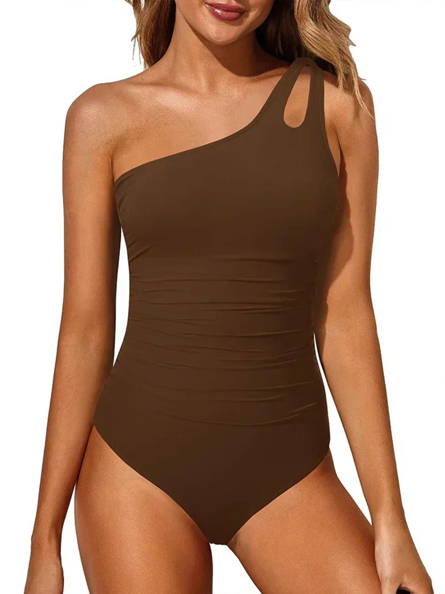 Eleganter Damen Badeanzug (Ein-Schulter). Figurschmeichelnder Schnitt für Sommer, Urlaub, Strand und Pool. Moderne Strandmode.