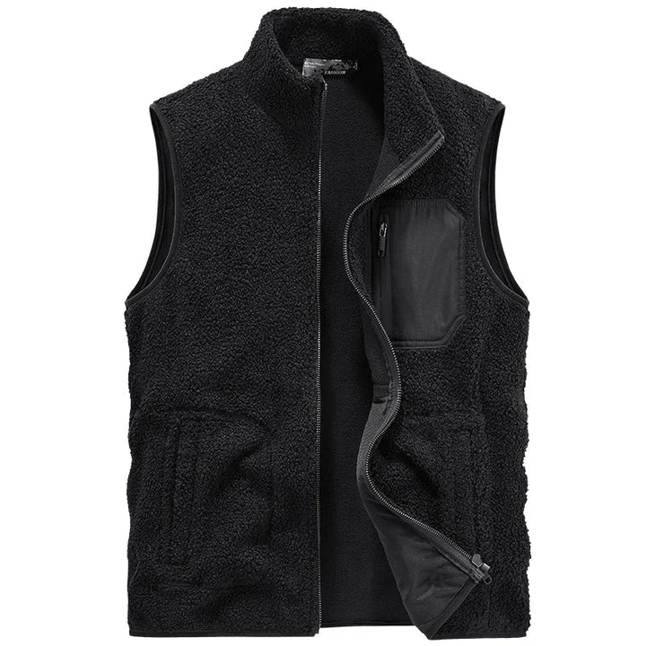 Moderne ärmellose Herrenjacke mit texturierter Oberfläche & funktionellen Taschen für den lässigen Herbst-Look.