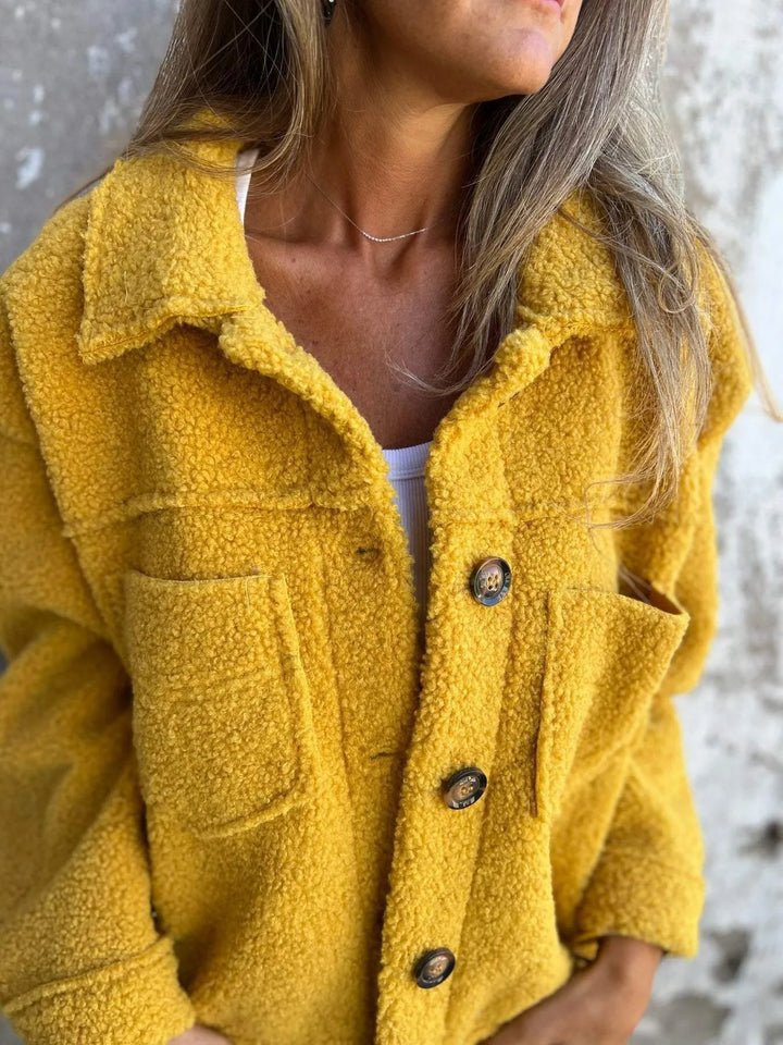 Schwarzer langer Damen Wintermantel, warm, mit eleganten Knöpfen und langen Ärmeln, vielseitig.