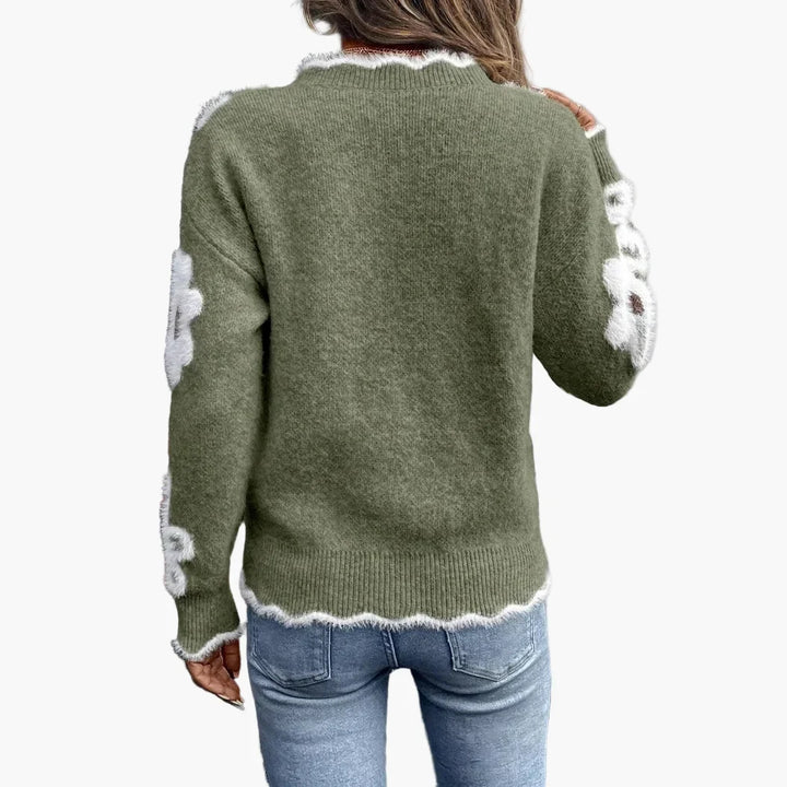 Gemütlicher Damen Strickpullover mit Blumenmuster und V-Ausschnitt. Ideal für Herbst- & Wintermode.