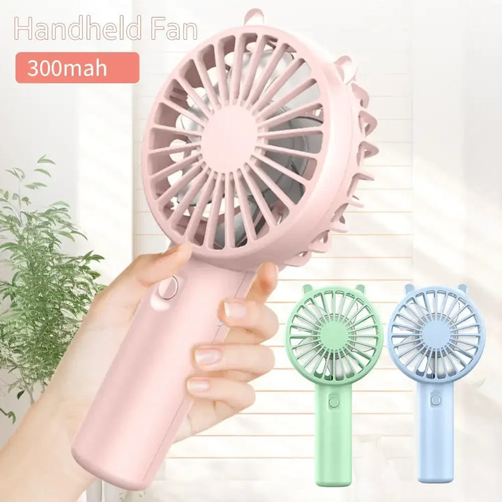 Mini-Handventilator mit USB-Ladefunktion, 3 Stufen, leicht und tragbar für unterwegs.