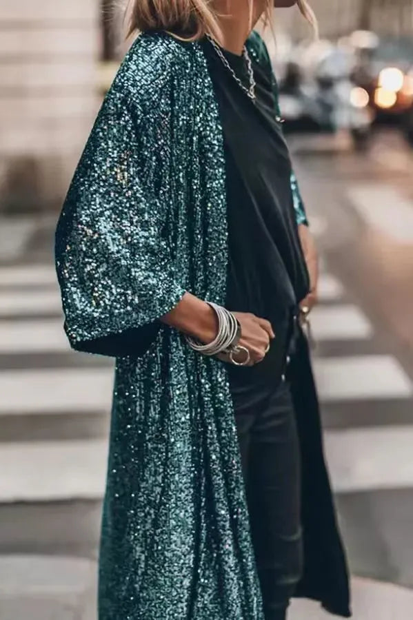 Langer Damen-Abendmantel für Herbsttage, elegant, mit Taillengürtel, Revers und seitlichen Eingrifftaschen.