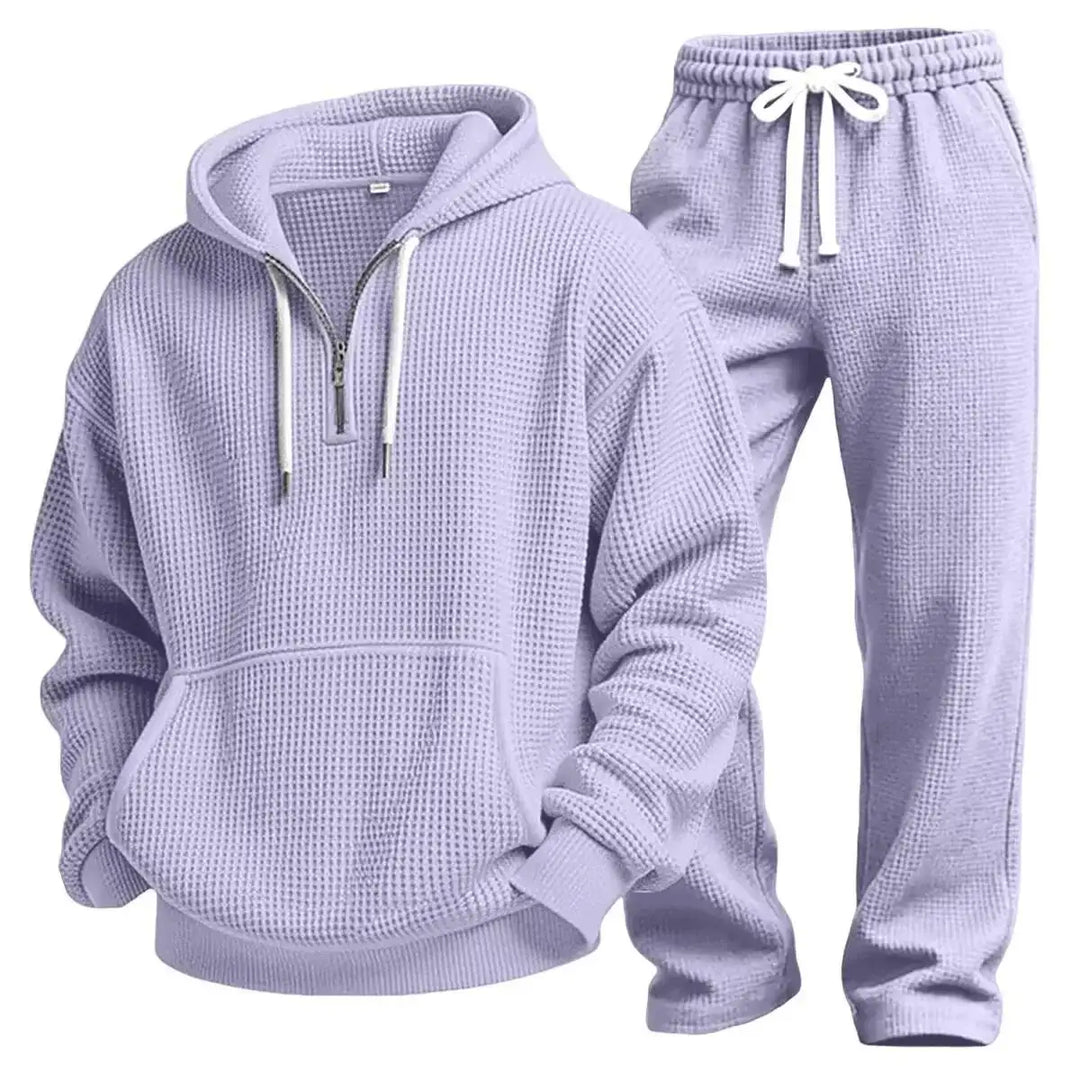 Stylischer Herren Freizeit-Zweiteiler, locker geschnittenes Sweatshirt & Jogginghose. Perfekt für Sport & Alltag.