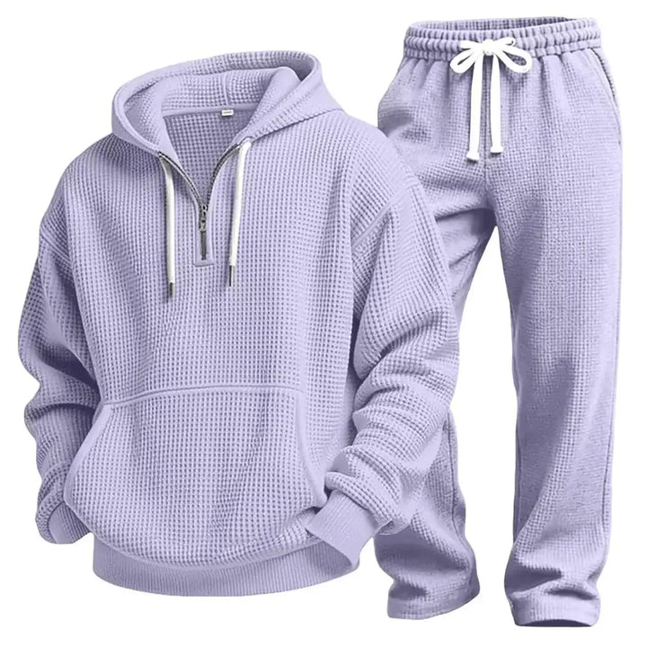 Stylischer Herren Freizeit-Zweiteiler, locker geschnittenes Sweatshirt & Jogginghose. Perfekt für Sport & Alltag.