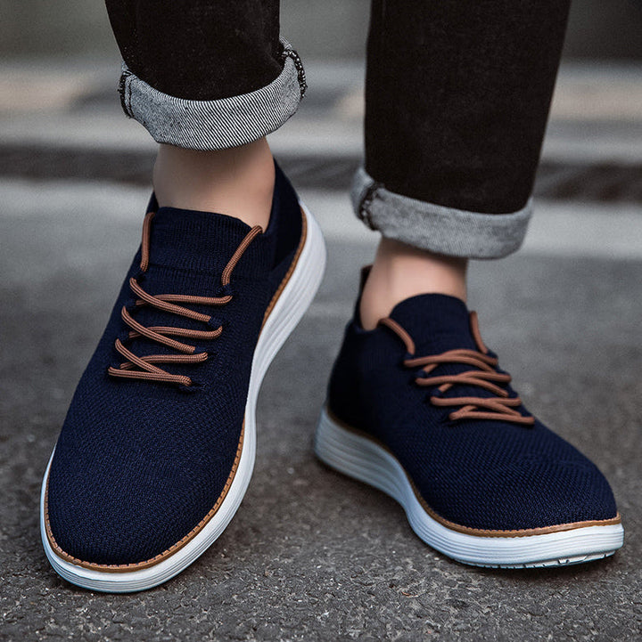 Robuster Herren Sportschuh mit rutschfester Sohle & stoßdämpfender Technologie.