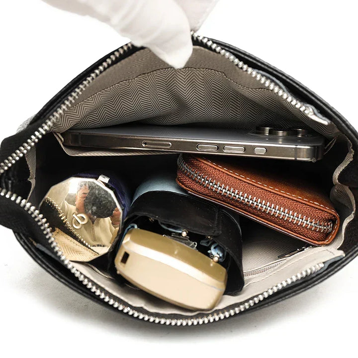 Zeitlose Damen Leder-Schultertasche, elegant als Crossbody oder Handtasche tragbar.