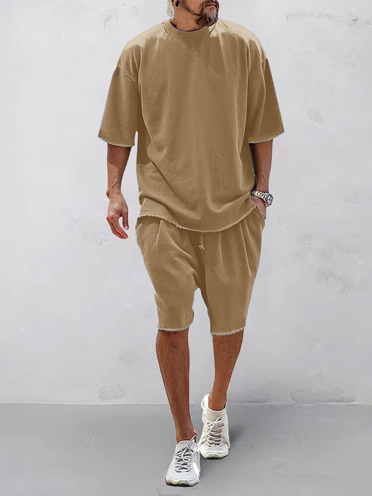 Herbstliches Herren Sportset: Lässiger Oversize Kapuzenpullover und Jogginghose für optimalen Komfort.