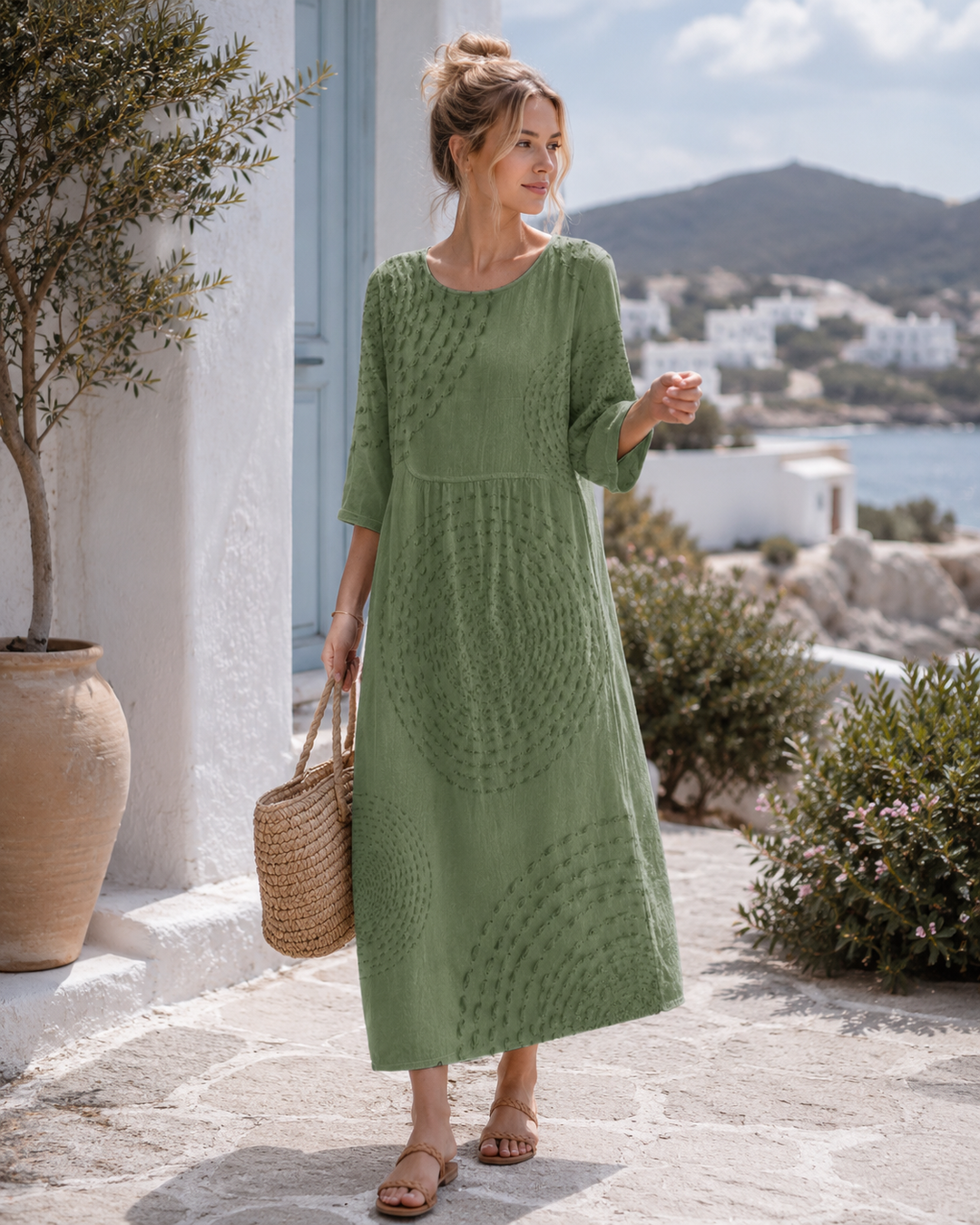 Lässiges Damenkleid mit lockerer Passform, Rundhals und Dreiviertelarm. Perfektes Midi Freizeitkleid für jeden Tag.