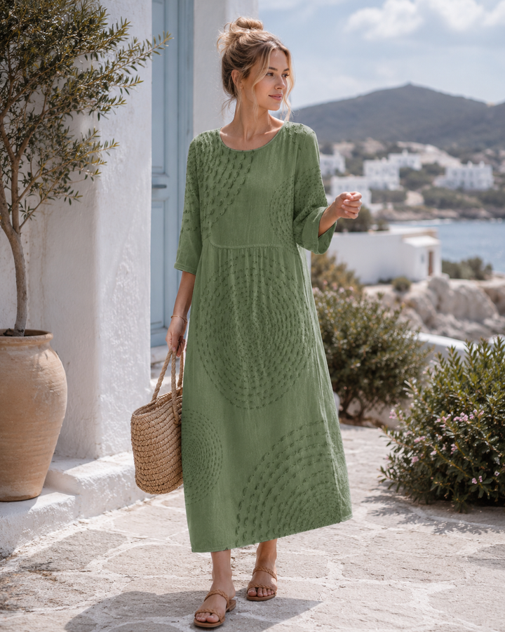 Lässiges Damenkleid mit lockerer Passform, Rundhals und Dreiviertelarm. Perfektes Midi Freizeitkleid für jeden Tag.