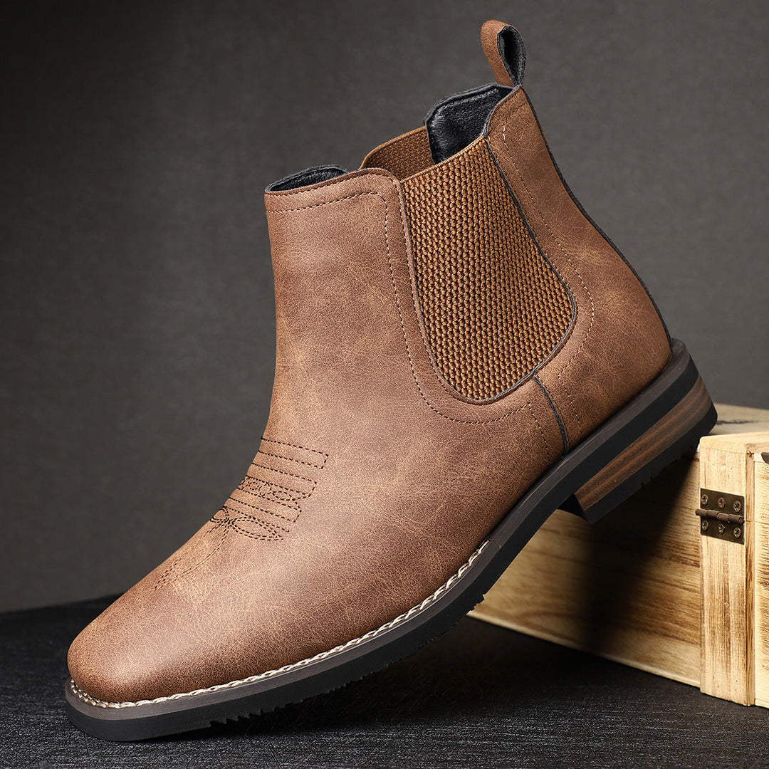 Klassische Herrenschuhe: schwarze Chelsea Boots mit elastischem Bund, urbaner Look für moderne Männer.