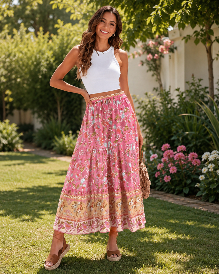 Rosa Boho-Maxikleid für Damen im Vintage-Stil, mit Blumenmuster, perfekt für romantische Sommerlooks und Urlaub.