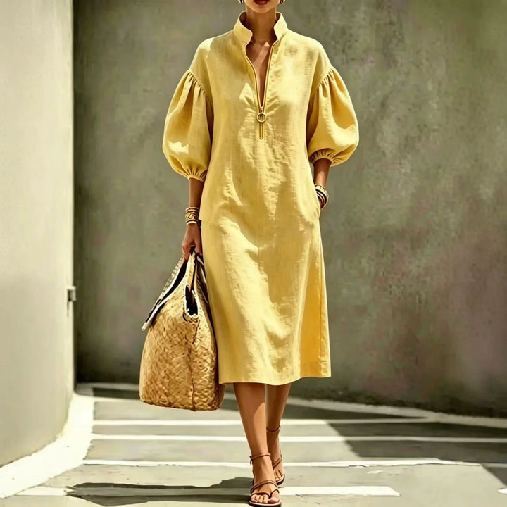 Sommerliches Damen Midikleid mit Puffärmeln, elegant und vielseitig für Alltag, Büro oder festliche Anlässe.
