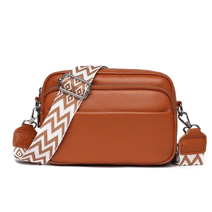 Graue verstellbare Damen-Schultertasche aus Leder, elegant & praktisch für jede Gelegenheit.