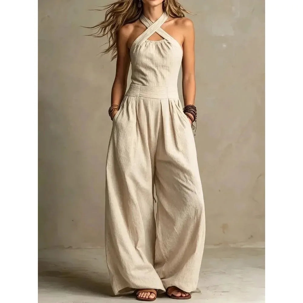 Eleganter Damen Overall mit Kreuz Halterung und seitlichen Cut-Outs. Ideal für Abendveranstaltungen.