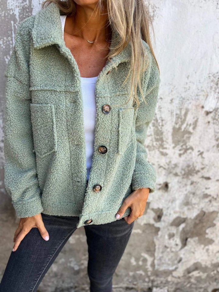 Warmer, vielseitiger Damen Wintermantel mit langen Ärmeln und eleganten Knöpfen, ideal für kalte Tage.