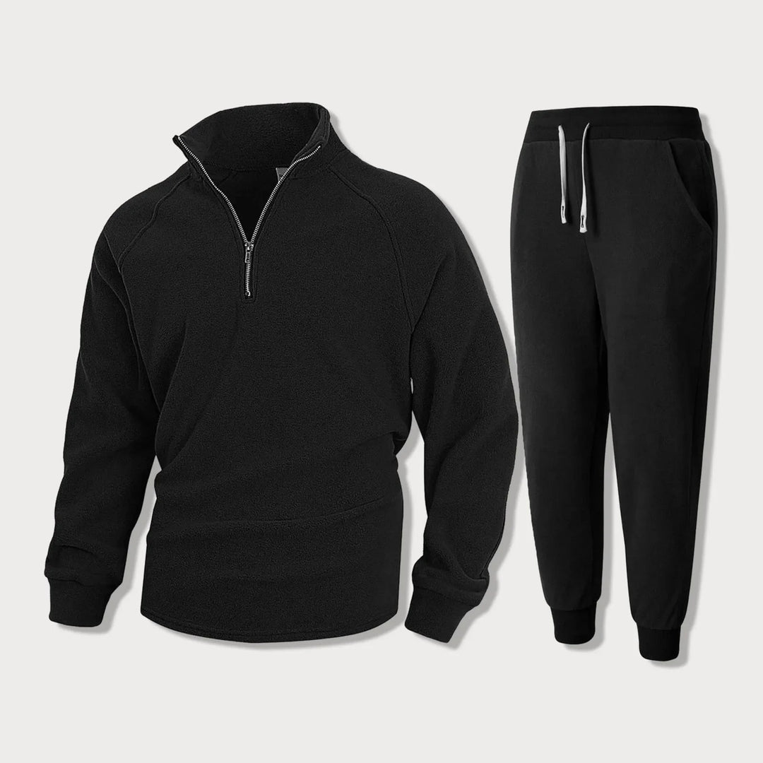 Lässiges Herren Trainingsanzug Set aus bequemem Stoff mit Halbem Reißverschluss Oberteil und Jogginghose für den Alltag.