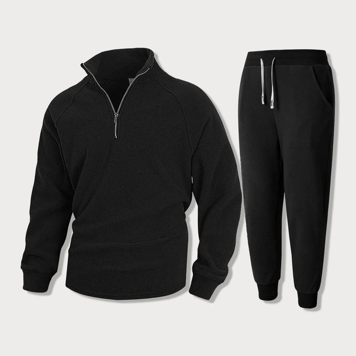 Lässiges Herren Trainingsanzug Set aus bequemem Stoff mit Halbem Reißverschluss Oberteil und Jogginghose für den Alltag.