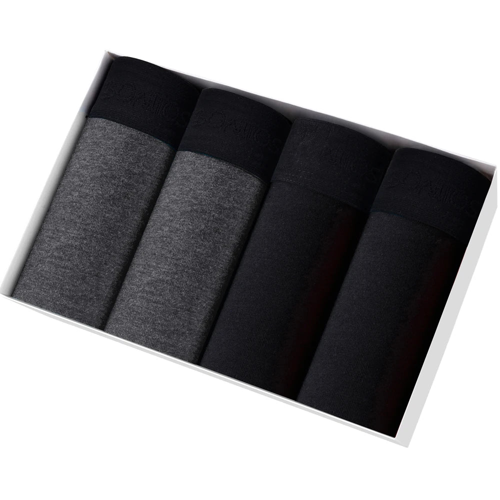 Nahaufnahme: Weiche Baumwoll-Boxershorts für Herren, 4er Pack, hoher Tragekomfort.