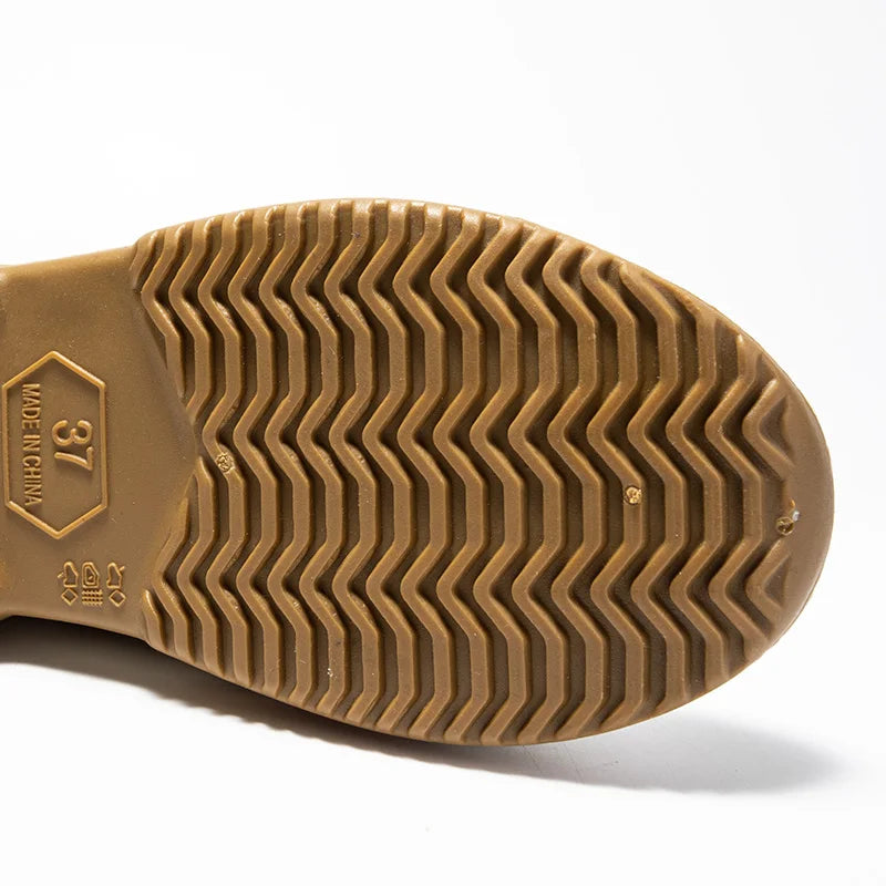 Nivara Damen Regenstiefel: Halbhohe, wasserdichte Gummistiefel mit sicherer Antirutschsohle.