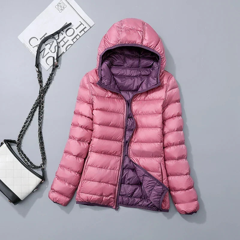 Robuste Damen Windjacke, leicht, wendbar, ideal für Wanderungen und sportliche Aktivitäten.