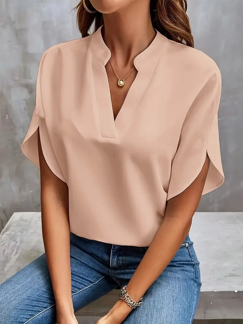 Damen Bluse mit elegantem Fall & lockerem Schnitt, ideal für Büro & Freizeit. V-Ausschnitt & Flatterärmel.