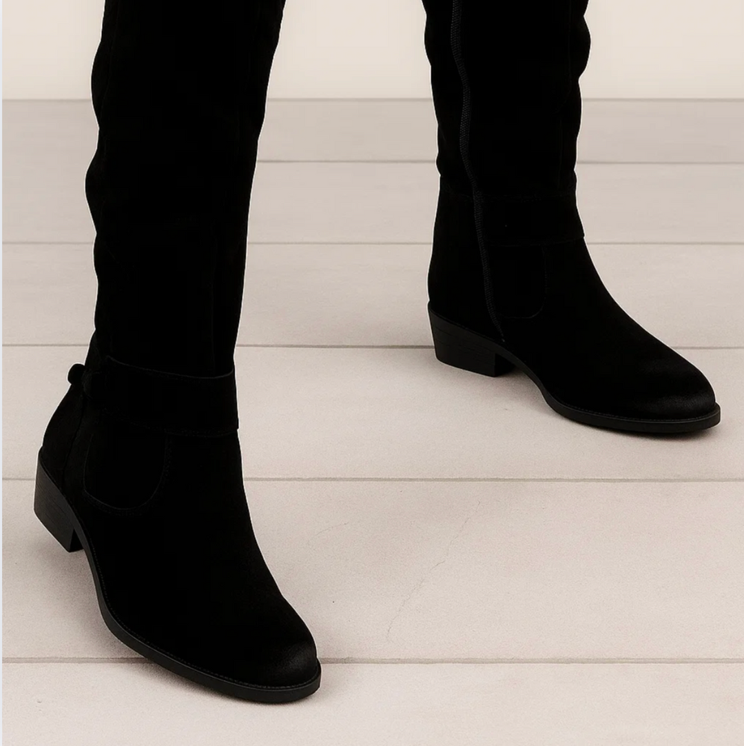 Schwarze elegante Stiefel für Damen, mittelhoher Blockabsatz. Vielseitig kombinierbar für Herbst-Looks.
