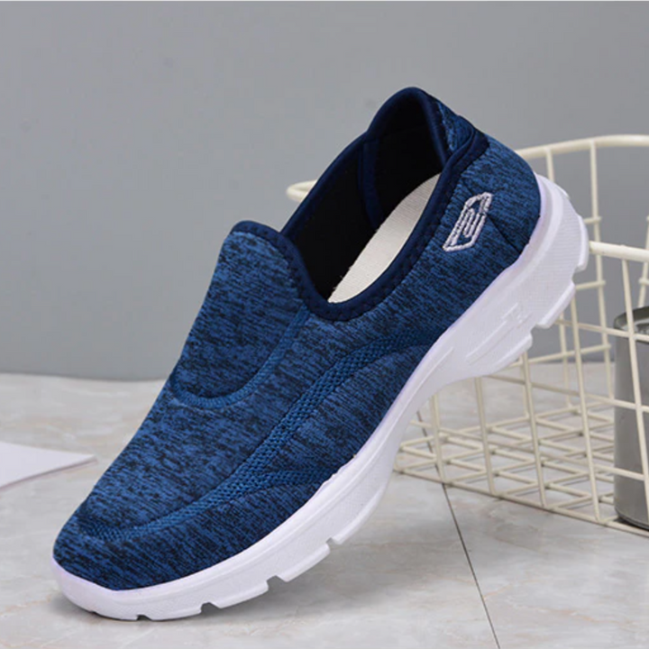 Bequeme blaue Damen Slip-On Schuhe, orthopädisch mit Luftpolster, perfekt für Arbeit und Sport.