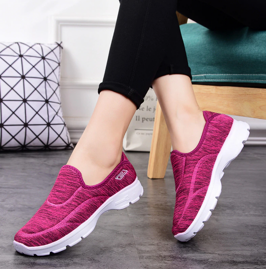 Rote Damen Slip-On Orthopädie-Schuhe mit Luftpolster-Sohle, ideal für Alltag, Arbeit und Sport.