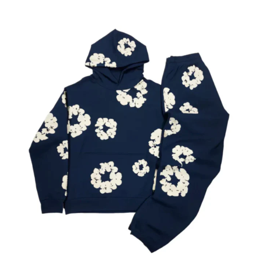 Stilvolle Freizeitbekleidung: Unisex Trainingsanzug mit Blumenprint. Ideal als sportlicher Alltagslook.