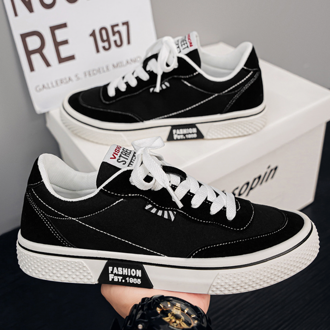 Bequeme Herren Skater-Sneaker in Pink und Schwarz, flache Freizeitschuh mit Schnürung für den täglichen Gebrauch.
