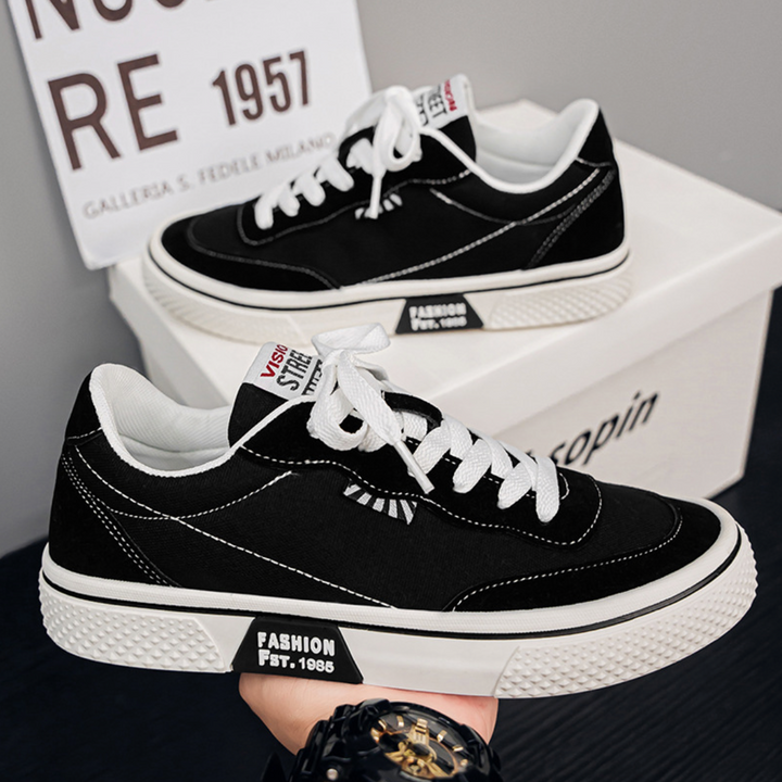 Bequeme Herren Skater-Sneaker in Pink und Schwarz, flache Freizeitschuh mit Schnürung für den täglichen Gebrauch.